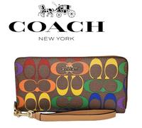 Portafoglio Coach CA720 lungo con cerniera e tela firmato arcobaleno nuovo co...