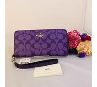 Portafoglio lungo Coach viola C4452 OUTLET in pelle con cinturino