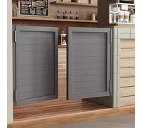 Porte oscillanti in legno massello con funzione di chiusura automatica per le divisioni del bagno e della cucina