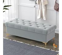 Pouf portaoggetti in velluto con design trapuntato e gambe dorate, perfetto come poggiapiedi o fasciatoio per spazi abitativi