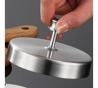 Pressa per hamburger in acciaio inox con superficie liscia rotonda e manico superiore per uno spessore uniforme e una separazione pulita degli alimenti