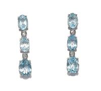 Preziosi orecchini con 6 topazi celesti e 4 diamanti da 0.10ct montati su oro bianco 18k.