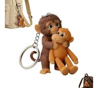 Protect Punch The Monkey Keychain, portachiavi 3D con simpatico pugno scimmia che tiene peluche portachiavi, scimmie che abbracciano portachiavi per zaino