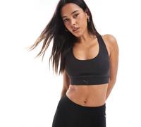 PUMA - Evolve Training - Reggiseno sportivo a supporto medio nero S