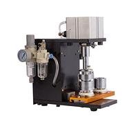 Punzonatrice pneumatica for la produzione di badge a induzione automatica Punzonatrice for l'elaborazione di badge con modelli a pedale