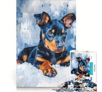 Puzzle da 1000 pezzi con cucciolo di Doberman nella neve ideale per giochi in famiglia e compleanno con poster e foglio di curiosità abbinati 50x75cm