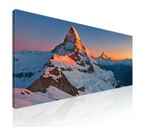 Quadro montagne al tramonto xxl, quadro moderno soggiorno orizzontale, montagne innevate, paesaggi montagne, Bagliore del tramonto sulla maestosa vetta delle montagne innevate mow33-150x60 cm
