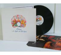 Queen - QUEEN a night at the opera. First press matt white embossed sleeve 1975, on EMI records. Top copy.