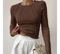 Questa esclusiva maglietta da donna a maniche lunghe presenta un collo rotondo a costine lavorate a maglia, una silhouette aderente che valorizza la figura e un design in vita corto con un tocco sexy 