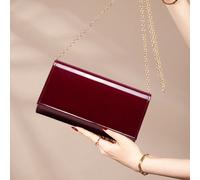 Questa lussuosa borsa clutch da donna con finitura a specchio e colore unito è alla moda e affascinante. Con un design a patta, è una scelta ideale per partecipare a feste e cene formali. La borsa è a