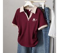 Queste sono magliette a maniche corte reversibili a due colori adatte per ragazze di età compresa tra 8 e 12 anni. Presentano una silhouette aderente con un design a blocchi di colore e un colletto se