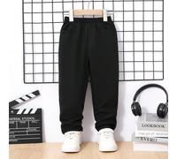 Questi pantaloni neri intrecciati classici per bambini piccoli presentano un design semplice ed elegante. Realizzati in tessuto intrecciato di alta qualità, sono rigidi e ben sagomati pur rimanendo mo