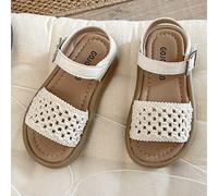 Questi sandali per bambine/ragazze molto popolari presentano un materiale superiore in pizzo bianco, abbinato a una cinturino alla caviglia in pelle bianca, con uno stile fresco e dolce. La suola este