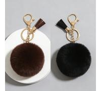 Questo adorabile set di portachiavi con nappe soffici è una piccola sorpresa per te o per i tuoi amici. La morbida texture a pompon è confortevole e le vivaci nappe aggiungono un tocco di vivacità in 