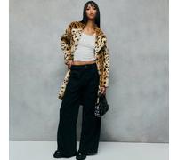 Questo cappotto con stampa animale aggiunge un tocco di lusso selvaggio ai look autunnali delle donne, ai guardaroba di cappotti invernali e ai costumi di Ognissanti. Il motivo audace lo rende un capo