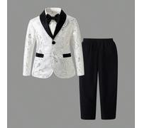 Questo completo da gentiluomo per ragazzi emana eleganza e raffinatezza. La giacca con risvolto stampato in oro valorizza istantaneamente lo stile complessivo, e gli elementi dorati brillano splendida