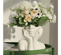 Questo design presenta una forma di vaso elegante, che presenta una posa di una donna che si copre il viso con le mani. Il design è semplice ma alla moda, con la posa unica delle mani a coppa piena di