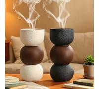 Questo elegante diffusore di oli essenziali in resina presenta uno schema di colori bianco e nero, adatto per la decorazione della casa, l'ufficio, le celebrazioni di vacanze e gli studi di yoga, serv
