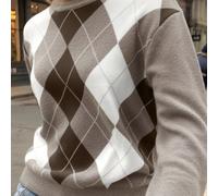 Questo maglione da donna alla moda per il 2025 presenta un morbido collo a giro e maniche lunghe, adatto sia per occasioni casual che formali. Realizzato in un tessuto morbido e con media elasticità, 