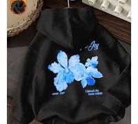 Questo morbido e selvaggio piumino con cappuccio presenta una base di colore nero solido con una stampa di orchidea rosa sul retro, emanando una sensazione di lusso. Il tessuto in piuma nascosto di co