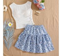 Questo nuovo completo da 2 pezzi per ragazze pre-adolescenti presenta una maglia casual e comoda in maglia jacquard blu a collo tondo abbinata a una gonna a due balze coordinata. La vita e l'orlo arri