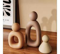 Questo set di 3 sculture astratte minimaliste moderne raffigura una famiglia di tre persone, mettendo in mostra l'armonia e il calore di un nucleo familiare. Le forme eleganti, i colori tenui e il des
