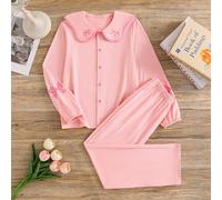 Questo set pigiama rosa a 2 pezzi è carino, alla moda, elegante e casual, composto da una camicia a maniche lunghe con colletto a bottoni e un paio di pantaloni decorati con un fiocco, adatto per le r