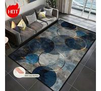 Questo tappeto oversize è realizzato in tessuto di piumino blu-grigio, con la versione premium che utilizza un materiale ad alta densità e spesso. Presenta un design personalizzato a motivi geometrici