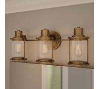 QUOIZEL Applique Riggs IP44, ottone antico, a 3 luci QUOIZEL