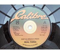 Real Thing - Real Thing She's A Groovy Freak 7" Calibre CAB105 EX 1980 there is punch hole in label rim & a handwritten number on label