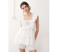 Reclaimed Vintage - Top punto smock stile western bianco con maniche a pipistrello e ricami in coordinato 38