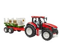 Trattore ROADMAX con rimorchio e tronchi