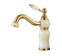 Rubinetto miscelatore per lavabo in ottone vintage con finitura dorata, design elegante per il rinnovamento del bagno e la decorazione della casa.