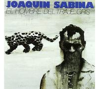 el hombre del traje gris