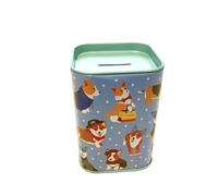 Salvadanaio in latta per bambini in colori vivi. Salvadanaio originale in latta con coperchio. Salvadanaio a buon mercato che può essere utilizzato anche come portapenne. (Cani)