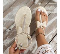 Sandali piatti da donna champagne con stampa casuale, perle e strass, stile principessa sexy, con cinturino tra le dita e decorazione floreale, per feste, spiaggia, matrimoni e vacanze CN36,CN37,CN38,