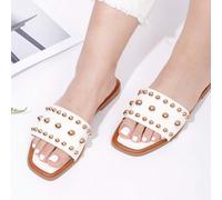 Sandali piatti da donna con borchie metalliche - ideali per outfit casual estivi e passeggiate in città Le infradito da donna, decorate con rivetti metallici, sono alla moda e accattivanti. Sono adatt