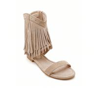 Sandali Piatti Stile Bohème à Franges et Finitions Artisanales Stile affermativo con ces sandales montantes d'inspiration, une pièce maîtresse pour vos tenues estivales.Tutti questi modelli:Dettagli d