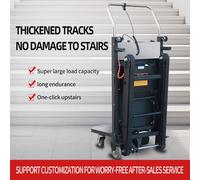 Scalatore delle scale cingolate. Scalatrice per scale da 270-400 kg con batteria. Macchina per la movimentazione dei carichi per carichi pesanti. Carrello cingolato, carrello a mano
