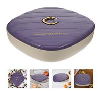 Scatola da dadi divisa con snack a piatto di frutta coperchio che servono la