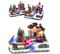 Scenario villaggio natalizio con neve albero di natale innevato luci e movimento