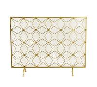 Schermo per camino Schermo for camino geometrico a pannello singolo con divisorio in rete, motivo a stella in metallo dorato