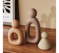 Scultura astratta semplice e moderna di una famiglia di tre persone, che raffigura l armoniae il calore familiare. Forma elegante con toni morbidi e vivacità astratta piena d amore e calore. Aggiunge