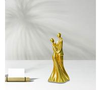 Scultura in resina raffigurante una coppia che si abbraccia per il camino o