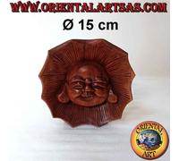 Scultura viso del buddha dell'abbondanza incavata nel legno di suar