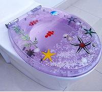 Sedile WC in resina trasparente con design conchiglia e sabbia, chiusura lenta igienica e cerniera antibatterica, migliora il comfort del bagno