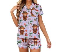 Set composto da due pezzi in tessuto con motivo a mucca, composto da una camicia a maniche corte con abbottonatura e pantaloncini per un comfort confortevole. Il vestito in due pezzi in morbido