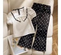 Set da 2 pezzi casual vintage Y2K per ragazze, outfit back to school, con camicia bianca a maniche a palloncino, colletto a fiocco con farfalla e bordi a contrasto, fantasia pois bianchi e neri, e pan