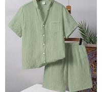 Set da 2 pezzi per ragazzo pre-adolescente con camicia a maniche corte con bottoni e collo tondo piccolo di colore unito e pantaloncini con vita elastica, adatto per il pendolarismo, la scuola, l'uso 