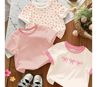 Set da 3 Magliette a maniche corte e collo tondo casual e versatili per ragazze giovani, con caratteristiche di motivi floreali boemi carini, righe pastello morbide e design con fiocco 3D, adatte per